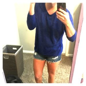 Lightweight blue sweater.